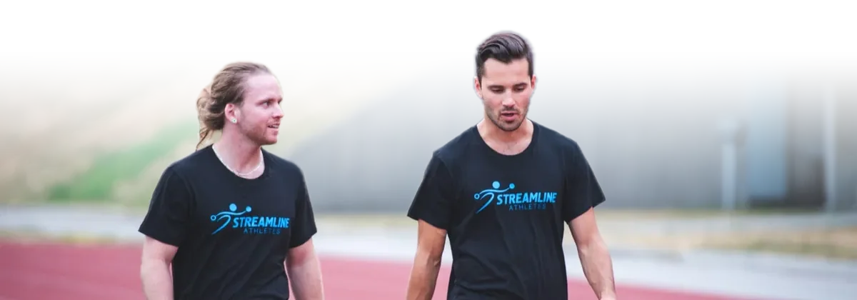 Alexandre Paré and Brett Montrose on the track in Streamline Athletes shirts, 2017